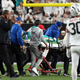 Medical staff tend to quarterback Tua Tagovailoa #1 of the Miami Dolphins as he is carted off on a stretcher after an injury during the 2nd quarter of the game against the Cincinnati Bengals at Paycor Stadium on September 29, 2022 in Cincinnati, Ohio.